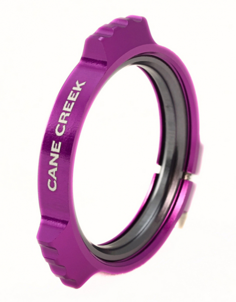 Система/шатуны Cane Creek Гайка преднатяга шатунов eeWing Crank Preloader 30mm Purple (BAI0030PP) - купить в Москве